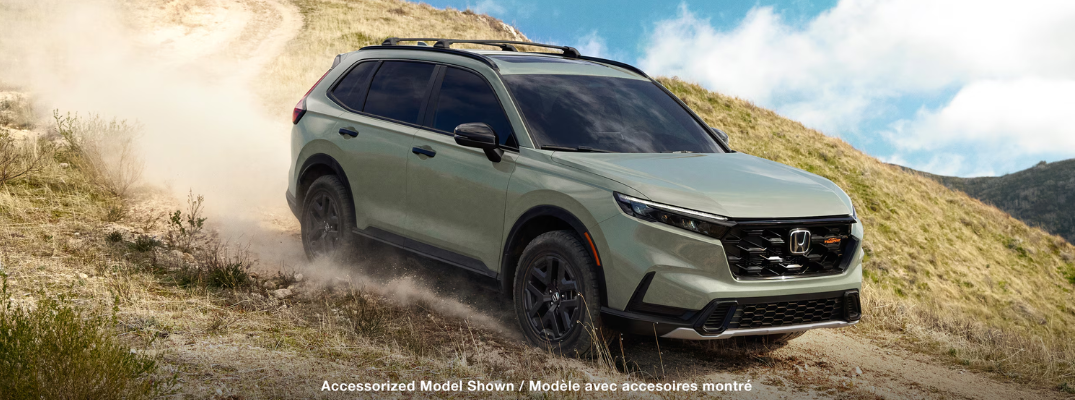 2026 Honda CR-V driving down a steep dirt road 